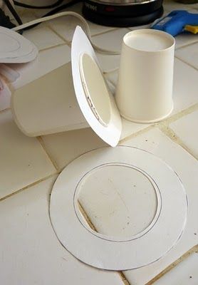 a white object sitting on top of a tiled floor