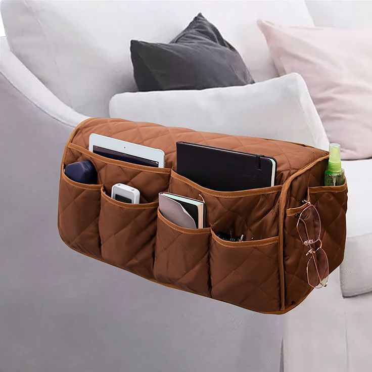 PRICES MAY VARY. Excellent Storage Space: The 2 in 1 sofa armrest protector has 14 pockets with different sizes, in different pockets, you can quickly and easily put the things you need. it can neatly stores your phone, tablets, book, magazines, tv remote control and so on Effectively Protection: Renew and decorate your chair armrest. Protect your chair arm from sweat stain, liquid stains, pet scratch or something else. Make your armrest keep pristine longer. A great choice for homes with childr Tv Remote Holder, Bedside Caddy, Ikea Ektorp, Recliner Couch, Remote Control Holder, Remote Holder, Storage Caddy, Armchair Slipcover, Pocket Storage