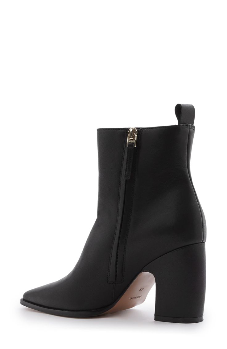 This versatile leather bootie is a perfect everyday staple with its clean-lined, sleek silhouette that features a modern blunted toe and curved block heel. 3 1/2" heel 5" shaft Side zip closure Leather upper/textile and leather lining/rubber sole Imported Modern Calf Leather Heeled Boots With Square Toe, Workwear Heeled Boots With Stacked Heel And Almond Toe, Calf Leather Ankle Boot Heels For Work, Workwear Almond Toe Boots With Stacked Heel, High Heeled Boots With Sculpted Heel For Work, Sculpted Heel Boots For Workwear, Office Ankle Heeled Boots With Reinforced Heel, Sleek Calf Leather Boots For Workwear, Calf Leather Boots With Contrasting Block Heel