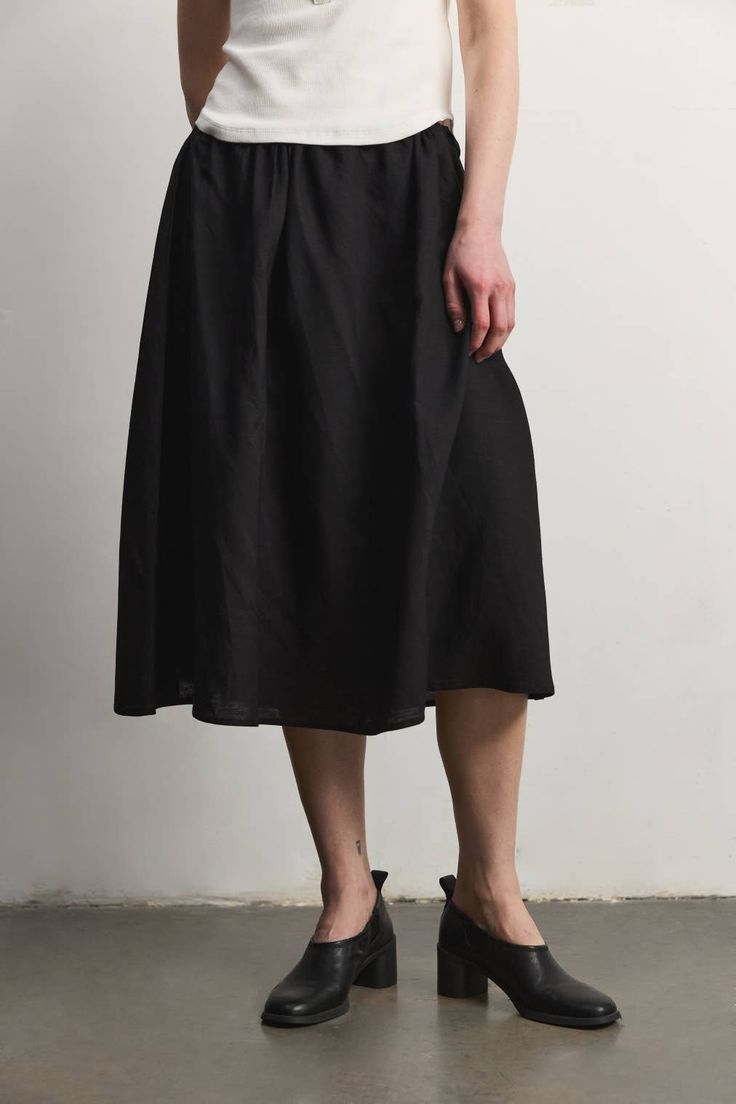 The Agnes Skirt is a timeless piece designed for comfort and style. Crafted from a light linen blend fabric, this midi skirt features a full silhouette and an adjustable drawstring waist for a personalized fit (can stretch an additional 3"). Fabric: 70% Tencel, 30% Linen Riley is 5'10" and wearing a size S (32" Bust, 24" Waist, 35" Hips) Measurements: Small (waist 13.5", length 28") Medium (waist 15", length 28.5") Large (waist 16", length 29") Bandana Scarf, Jumper Dress, Small Waist, Swimwear Accessories, Long Sweaters, Long Sleeve Sweatshirts, Short Pants, Timeless Pieces, Denim Pants