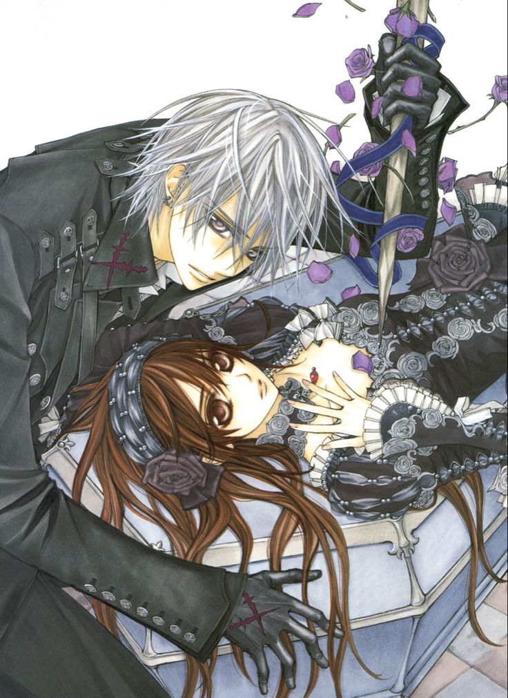 two anime characters laying next to each other on top of a table with flowers in the background