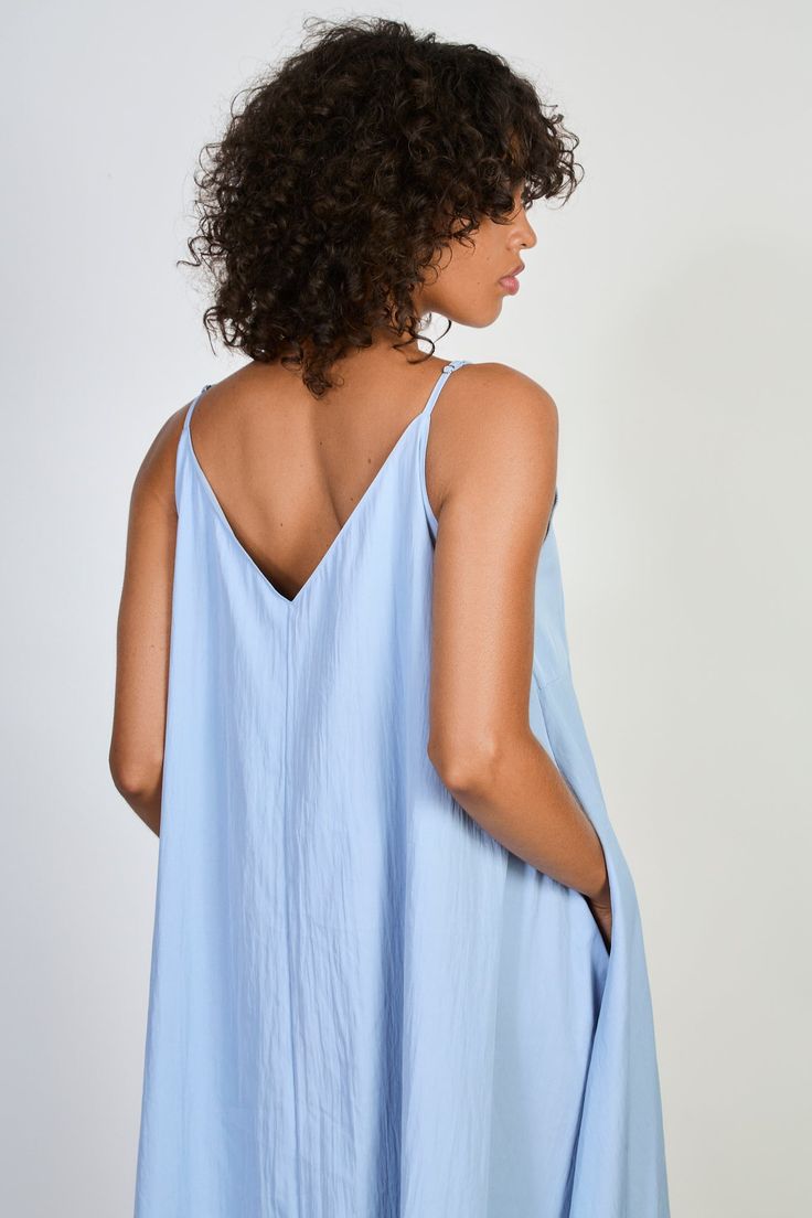 Blue V neck floaty midi dress Flowy V-neck Breezy Maxi Dress, Spring V-neck Beach Dress, Breezy V-neck Maxi Dress For Brunch, Flowy V-neck Summer Dress, Brunch Sundress V-neck Maxi Dress, Chic Blue V-neck Midi Dress, Breezy V-neck Beach Dress For Daywear, Chic V-neck Rayon Maxi Dress, V-neck Viscose Dresses For Loungewear