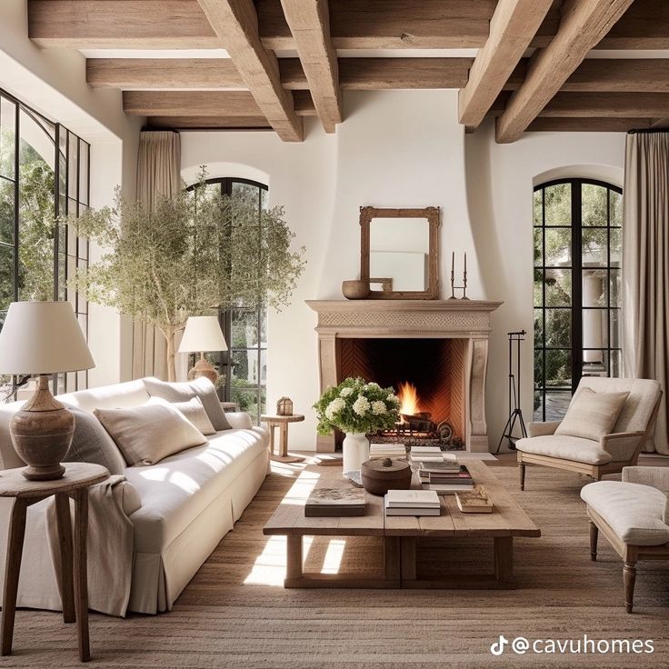 a living room filled with furniture and a fire place in the middle of a room