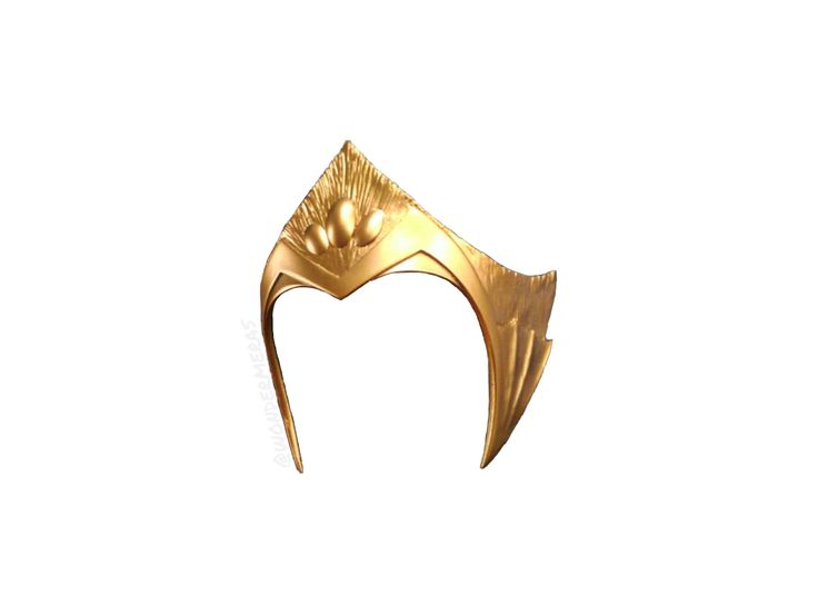 a gold colored headpiece on a white background in the shape of a bird's wing