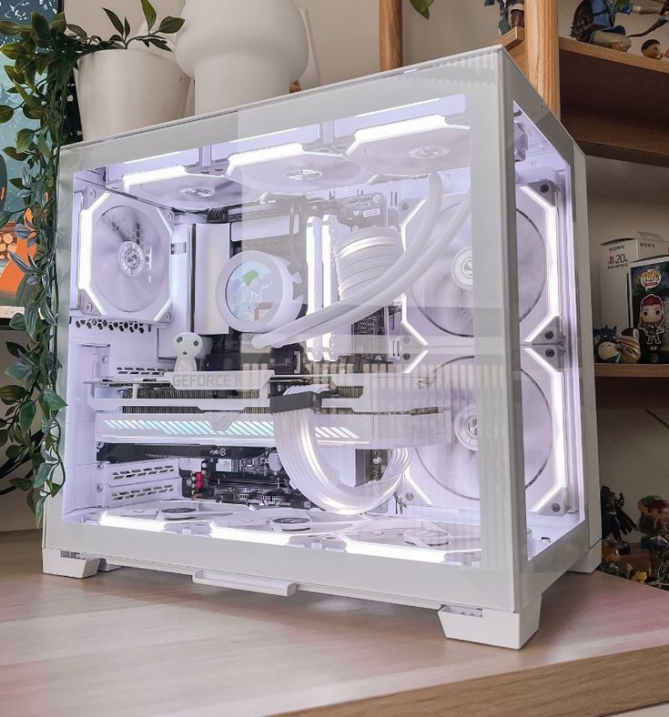 a white computer case sitting on top of a wooden desk