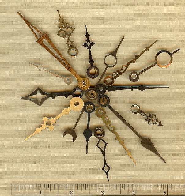 a clock made out of different types of tools