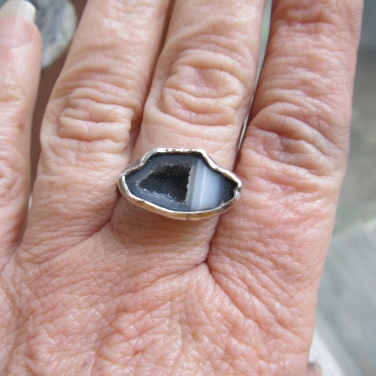 "Silver Mini Geode Ring Gray Druzy Ring Sparkly Druse Gemstone Ring: A stunning, one-of-a-kind, handmade stackable ring featuring a natural sparkling druzy geode set in sterling silver. The geode is gray and white and it measures 11/16\" by 7/16\". Band is 1/16\" wide. The ring itself is a size 6. Completely handmade by myself in sterling silver. Enter my shop: https://www.etsy.com/shop/artdi Join me on Facebook: https://www.facebook.com/Artdi-Diana-Anton-Jewelry-Design-44805607932/ Find me on I Unique Stackable Crystal Ring As Gift, Artisan Rings With Stones, Unique Stackable Crystal Ring For Gift, Spiritual One-of-a-kind Rings For Anniversary, Unique Adjustable Gemstone Ring, Stackable Agate Jewelry For Gifts, Stackable Agate Jewelry As A Gift, Adjustable Stackable Rings With Natural Stones, Toe Ring With Natural Stones For Gift