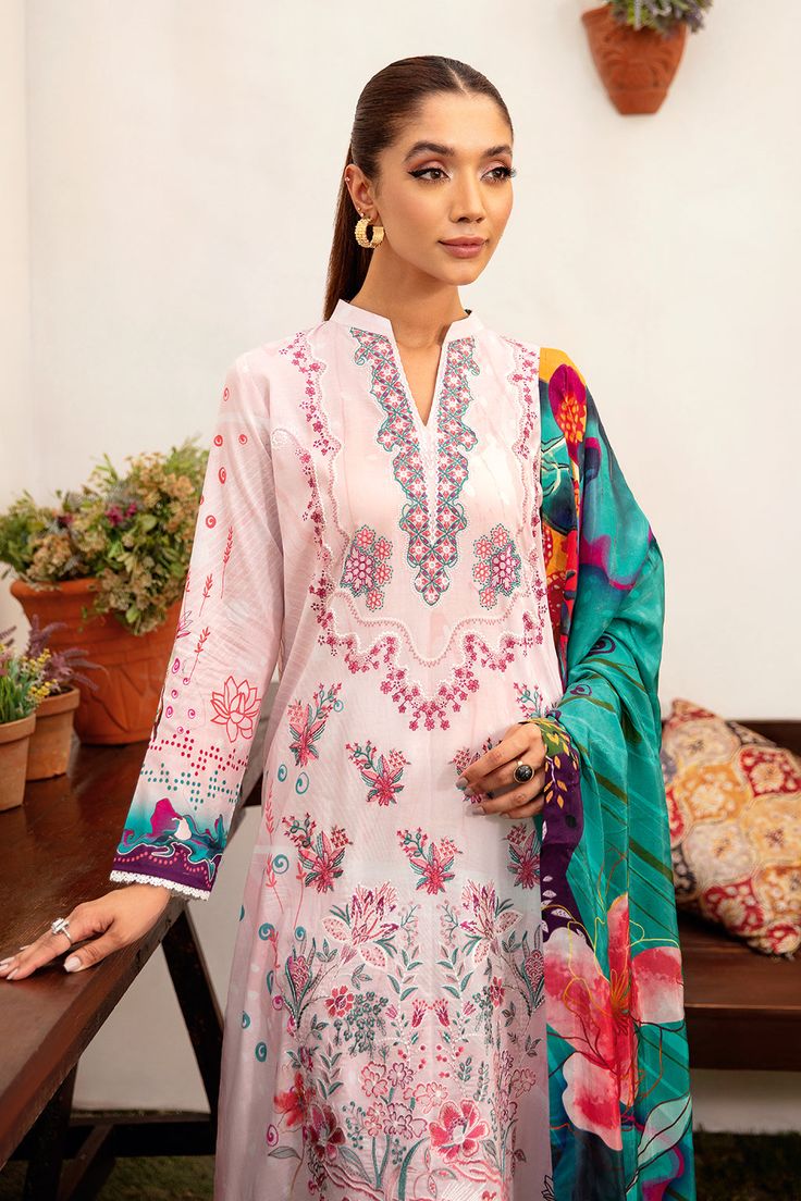 Description Embroidered lawn frontEmbroidered patch for damanPrinted lawn backPrinted sleevesPrinted minar fabric dupattaPlain dyed trouser Pink Cotton Lawn Suit For Eid, Pink Cotton Lawn Suit With Dupatta, Spring Lawn Suit With Multicolor Embroidery And Printed Motifs, Pink Cotton Lawn Suit With Resham Embroidery, Multicolor Cotton Dupatta With Naqshi Detail, Spring Cotton Lawn Suit With Naqshi, Unstitched Pink Shantoon Lawn Suit, Pink Unstitched Shantoon Lawn Suit, Multicolor Cotton Kurta With Naqshi Detailing