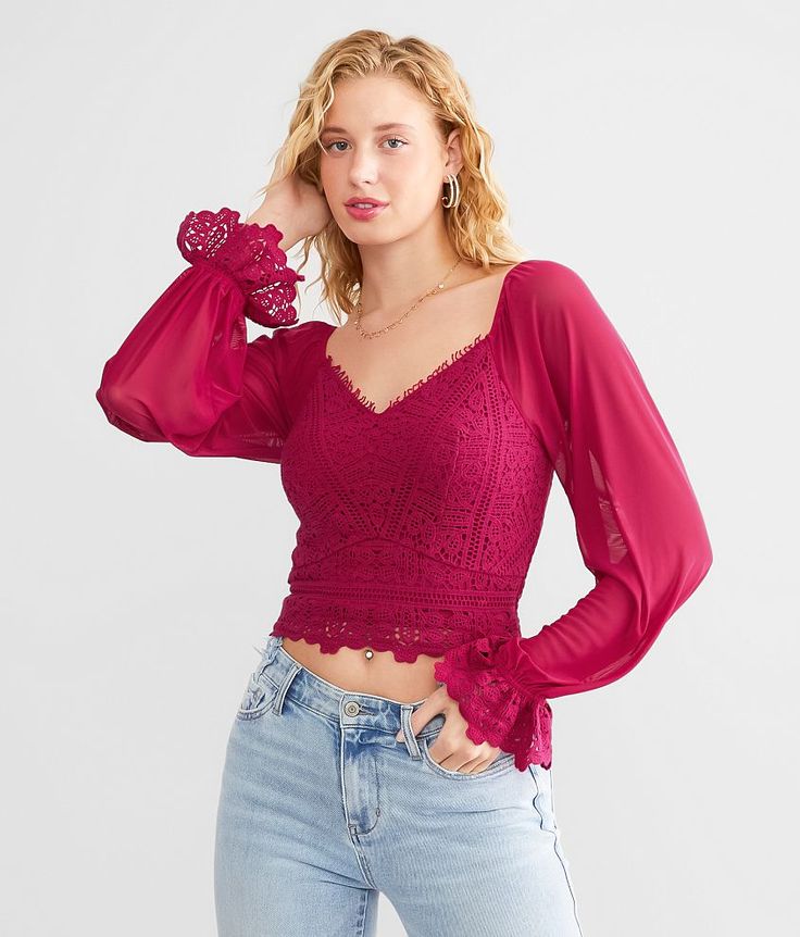 Willow & Root Crochet Cropped Top - Pink Small, Women's Cerise Lined knit v-neck top Smocked back Contrast mesh sleeves Elasticized cuffs Bust measures 28 on size small Body length 17 on size small. Self: 100% Cotton. Lining: 96% Polyester 4% Spandex. Mesh: 90% Polyester 10% Spandex. Hand wash cold. Do not bleach. Lay flat to dry. Do not iron.. Measurements: Bust -Fullest part of bust with arms at sides. Waist -Circumference of natural waist: above belly button below rib cage. Hips -Standing wit Fall V-neck Top With Sheer Sleeves, Spring V-neck Top With Lace Cuffs, Elegant Fitted Crochet Top With V-neck, Fall Season V-neck Mesh Top, Fitted Lace Crochet V-neck Top, Fitted Lace V-neck Crochet Top, V-neck Tops With Sheer Sleeves For Spring, Chic Fitted Crochet Top With V-neck, Fall Sheer Sleeves V-neck Tops