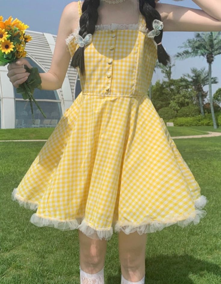 🌞 Step into Sunshine with Our Yellow Plaid Picnic Dress! 🌼👗 🌼 Cheerful and Chic: Our Yellow Plaid Picnic Dress is designed for those who appreciate the brightness of sunshine and want to radiate style effortlessly. Ideal for individuals who love to blend a touch of happiness with fashion. ✨ Superior Quality: Crafted with precision to ensure top-notch quality and style. This dress is designed to keep you looking both joyful and confident, whether you're out for a picnic or a casual outing. 💫 Summer A-line Sundress For Picnic, Cottagecore Ruffled Summer Dresses, Yellow Cottagecore Dress For Garden Party, Cute A-line Sundress For Garden Party, Cute Gingham Dresses For Day Out, Yellow Sundress For Summer Picnic, Yellow Summer Picnic Sundress, Cute Gingham Sundress For Picnic, Cute Spring Mini Dress For Picnic