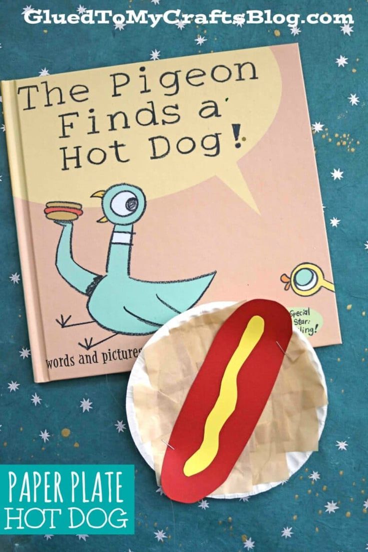 the paper plate hot dog is next to a book