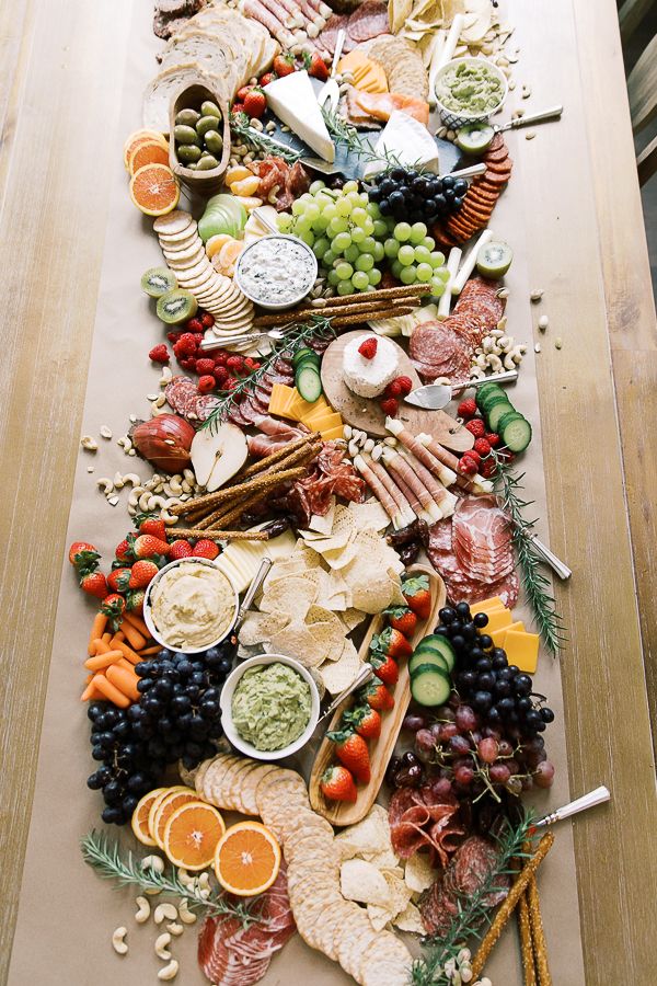 a table topped with lots of different types of food