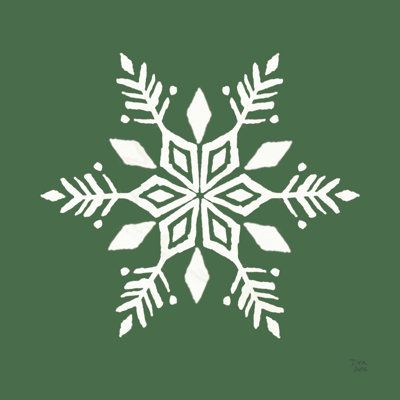 a white snowflake on a green background