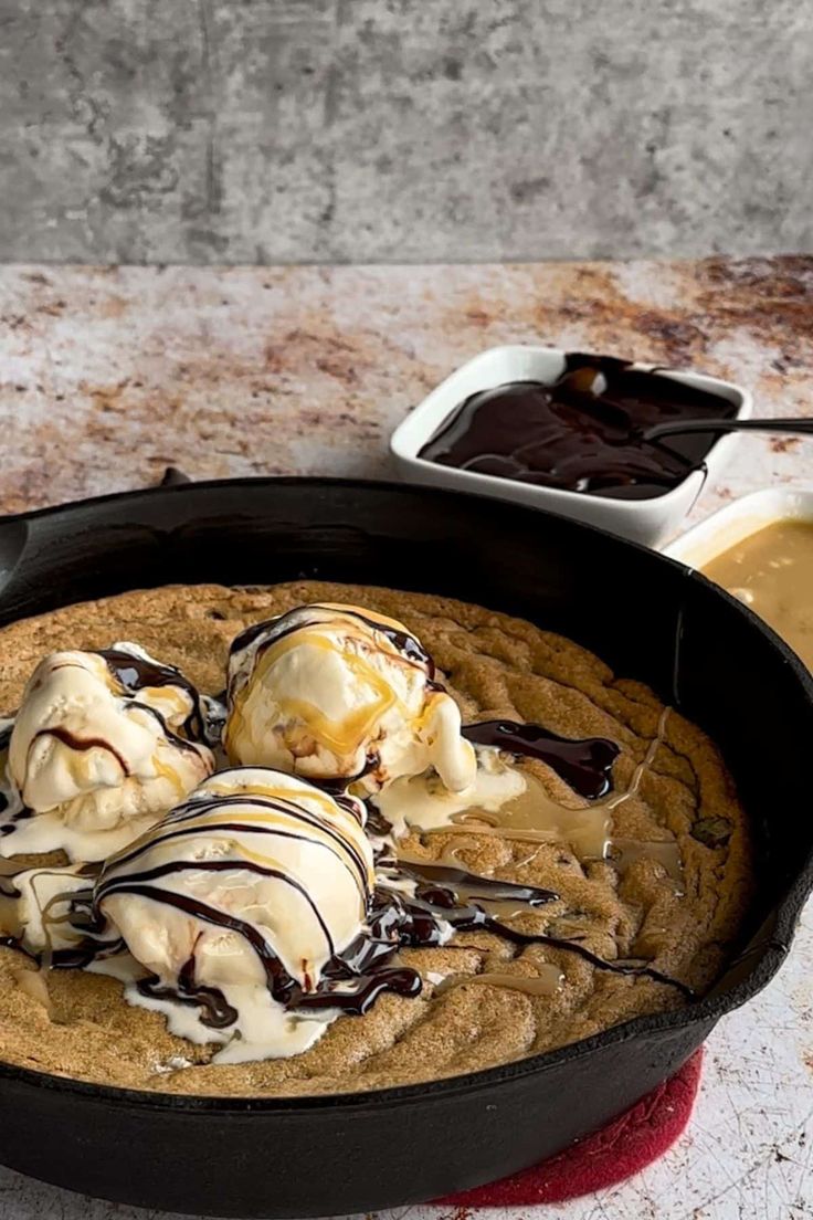 a skillet filled with ice cream and chocolate