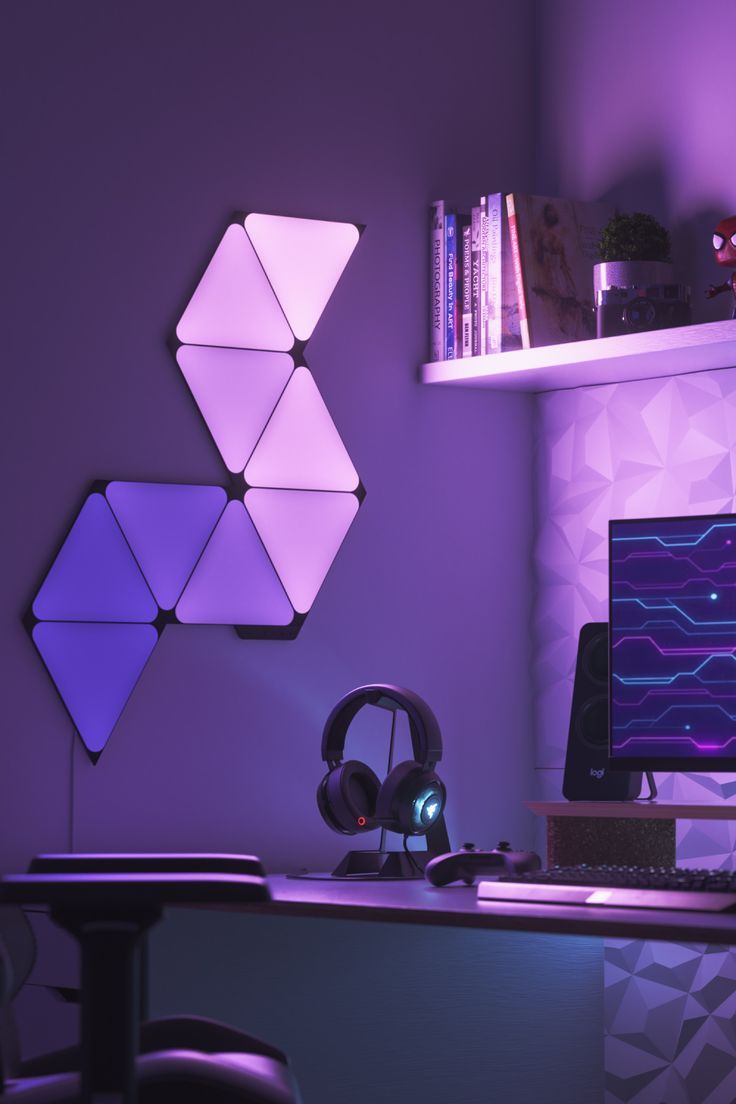 Nanoleaf Shapes Black Triangle Light Panels mounted in a gaming setup Nanoleaf Designs, Gamer Room Design, Nanoleaf Lights, Simple Bed Designs, Small Game Rooms, Gaming Setup Ideas, Gaming Room Ideas, Best Gaming Setup, Gaming Space