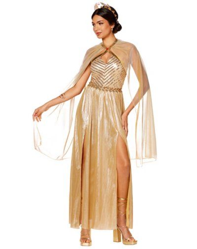 From Our Exclusive Signature Collection. Become a part of history and look good doing it when you wear this Goddess of the Sun Costume. This gold dress glistens in the light and features a halter neckline and striped accents on the torso. Put on the included leaf belt and matching headband so you can shine as bright as the sun! Includes: Dress Headband Belt Pin Halter neckline Sleeveless Pull-down style Material: Polyester, spandex Care: Spot clean Imported Note: Shoes sold separately The Sun Costume, Goddess Of Sun, Goddess Plus Size, Roman Goddess Costume, Sun Goddess Costume, Sun Costume, Goddess Of The Sun, Leaf Belt, Prisoner Costume