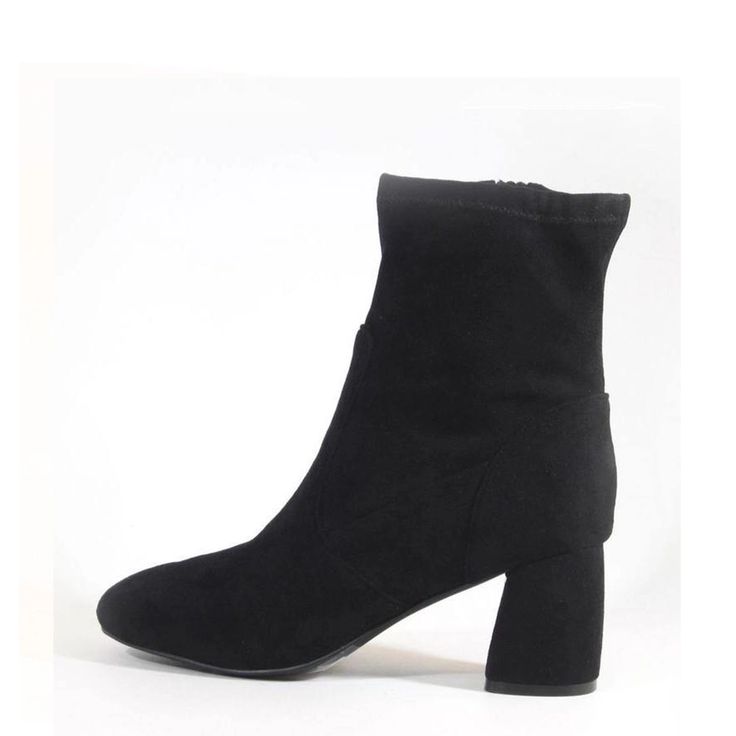 Looking for the perfect black bootie? Here it is! Strut the streets in these ankle fitted classic black booties. Go from professional to rockstar in our BALLYN faux suede or faux leather booties. Perfect minor stretch around the ankle with a low block heel to finish. Trendy Mid-calf Heeled Boots Medium Width, Trendy Black Mid-calf Heeled Boots, Fitted Suede Booties For Fall, Trendy Mid-calf Heeled Boots, Winter Suede Booties Medium Width, Winter High Ankle Booties, Medium Width, Winter High Ankle Medium Width Booties, Fitted High Ankle Black Chelsea Boots, Winter Ankle Booties Medium Width