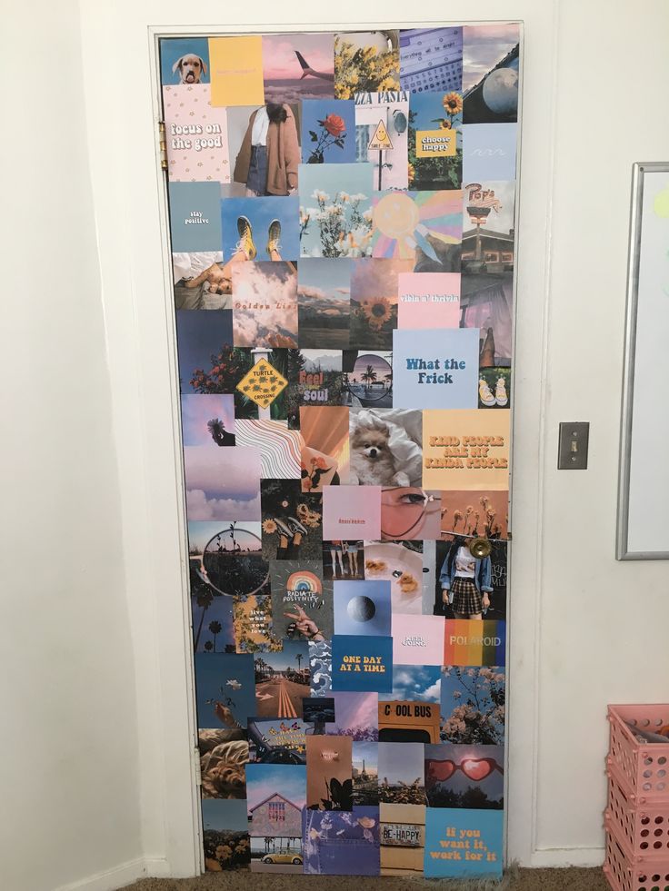 a door covered in pictures and magnets on the side of it's front door