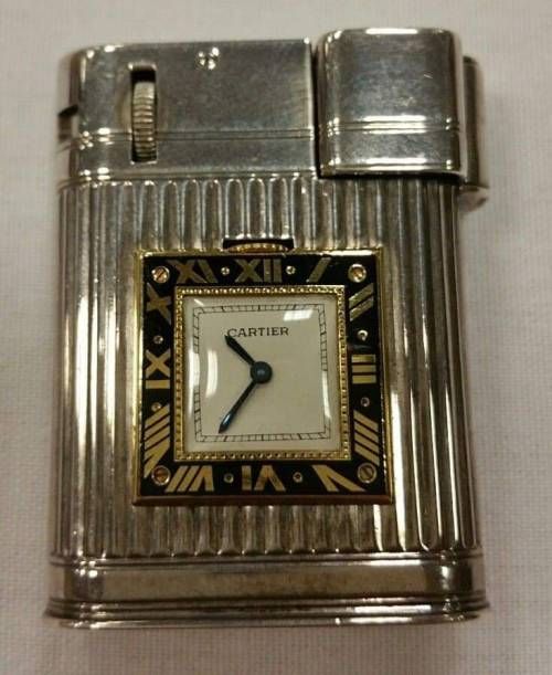 an antique watch with roman numerals on the face