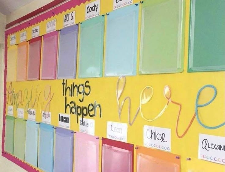 there are many different colored papers on this bulletin board that says, things happen here