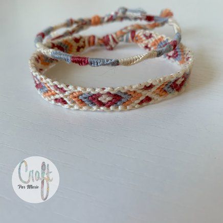 three bracelets with different colored beads on top of a white surface and the words craft for