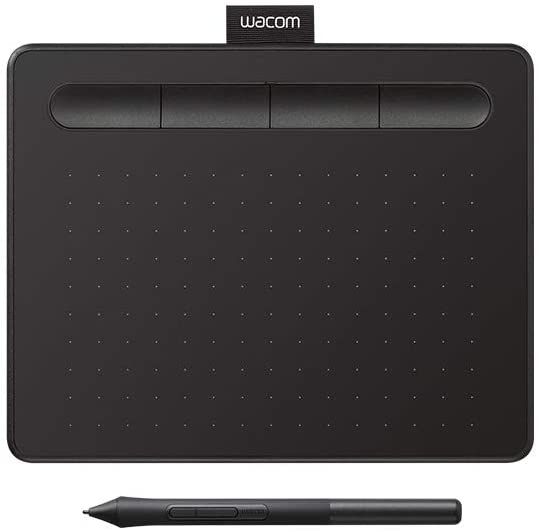 the wacom pen and tablet are next to each other