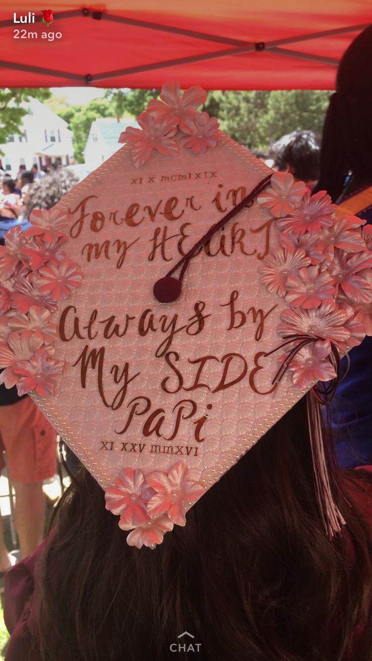 a pink graduation cap with flowers on it that says, forever in my heart always by my side