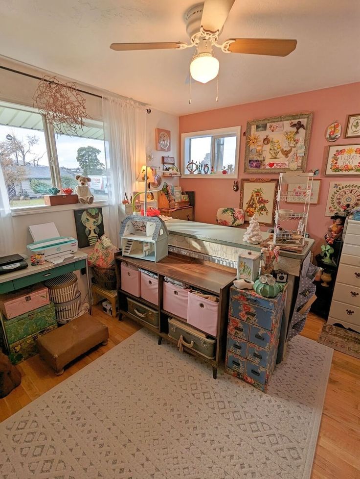 a room with lots of furniture and decor on the walls, including dressers and drawers