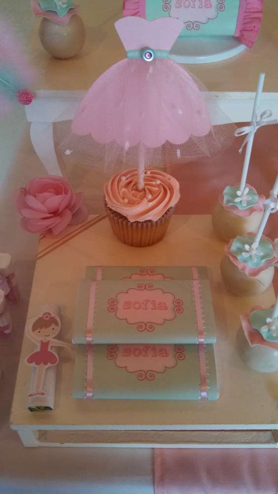 there is a cupcake and other items on the table