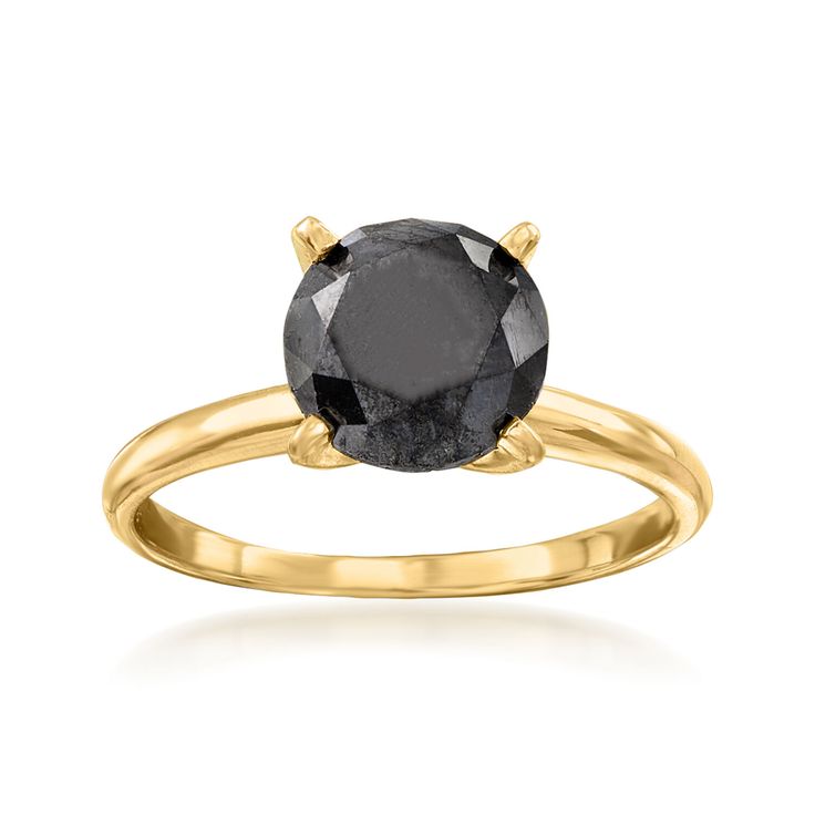 a yellow gold ring with an oval black diamond in the center, on a white background