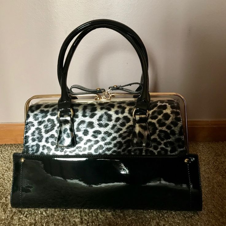 Glitz & Ears Animal Print/Black Faux Patent Leather Purse. Carry Using Handles Or The Detachable Shoulder Strap Inside. New W/Tag. 9”Tx13.5”W The Bottom Is 14”X6” Black Tote Satchel For Party, Black Satchel For Party, Black Double Handle Satchel For Parties, Black Bag With Animal Design For Everyday Use, Black Animal Design Bag For Everyday Use, Black Shoulder Bag With Animal Design For Everyday Use, Black Bags With Animal Design For Everyday Use, Trendy Black Bag With Animal Design, Trendy Black Bags With Animal Design