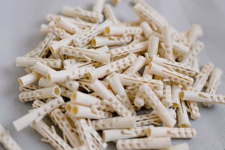 several pieces of ivory colored wooden beads