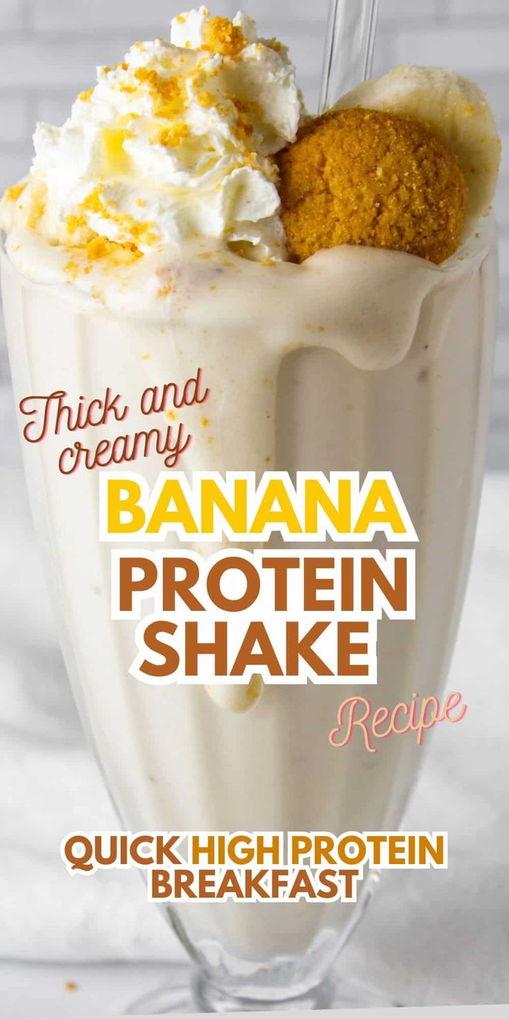 banana protein shake recipe in a glass with whipped cream and orange zest on top