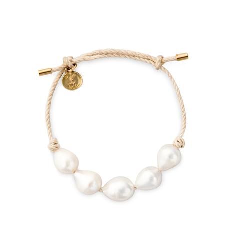 The sound of the ocean is right at your fingertips with our new Puka and... Adjustable Pearl White Bracelet With Pearl Drop, Elegant White Pearl Bracelet For Summer, Pearl White Adjustable Pearl Charm Bracelet, Adjustable Gold Pearl Bracelet For Summer, Elegant Adjustable Beaded Bracelets For Vacation, Elegant Adjustable Beaded Bracelet For Vacation, Adjustable White Pearl Bracelet For Summer, Adjustable Everyday Bracelets With Pearl Drop, Adjustable Pearl Bracelets For Summer