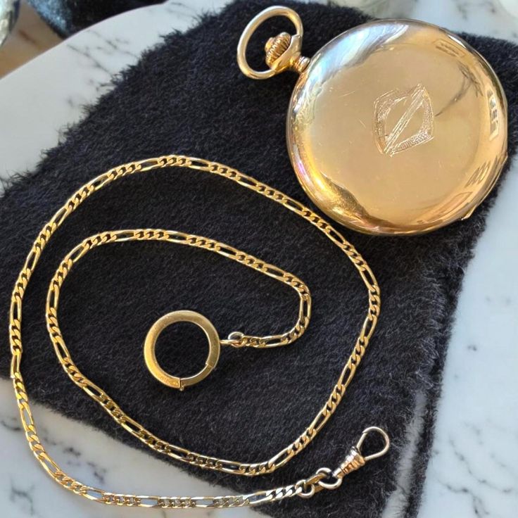 Antique Solid 14k Yellow Gold Pocket Watch with 19" 14k Watch Chain SPECTACULAR!! Amazing Old Gold 14k 585 Pocket Watch!! Comes on a 14k yellow gold watch chain. I don't believe chain is from the 1920's, I believe it was added later on with second owner (1980's) Watch case measures approximately 50mm across. Chain is just under 19" end to end. Total weight with chain 87.2 grams! I am not sure of the exact year of this watch, two different dates engraved inside front cover oldest date 1928 approx Classic Yellow Gold Jewelry And Watches For Anniversary, Classic Engraved Jewelry And Watches, Timeless Yellow Gold Jewelry And Watches, Polished Finish, Luxury 14k Gold Jewelry And Watches, Gold Polished Jewelry And Watches, Timeless Polished Yellow Gold Jewelry, Timeless Yellow Gold Jewelry With Polished Finish, Classic Yellow Gold Necklace For Collectors, Timeless Gold Jewelry And Watches With Round Shape