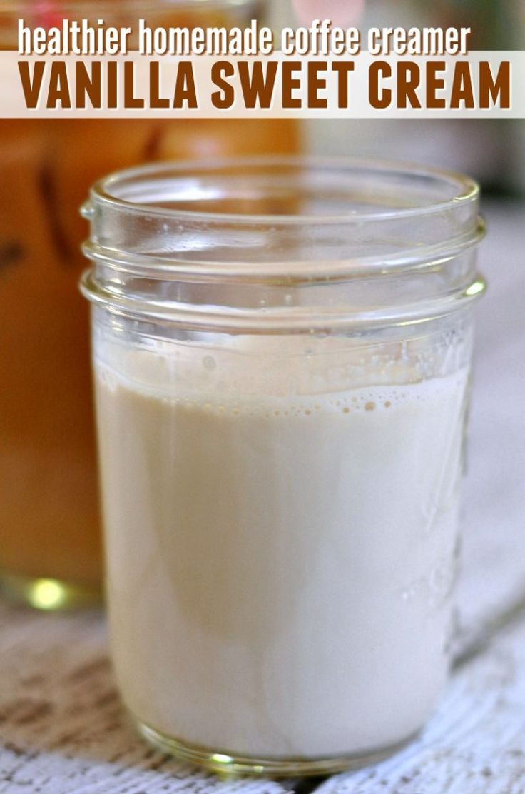 a jar filled with vanilla sweet cream sitting on top of a table