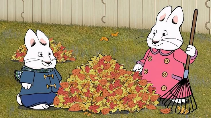 two white rabbits are playing with leaves in the grass and one is holding an umbrella