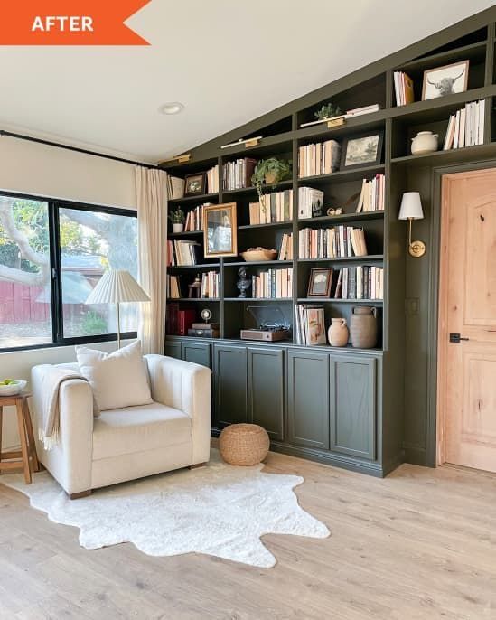 the living room is clean and ready to be used as an office or study area