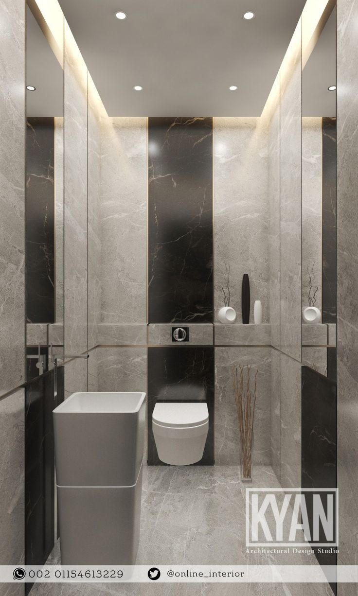 a modern bathroom with marble walls and flooring, along with a white toilet in the center