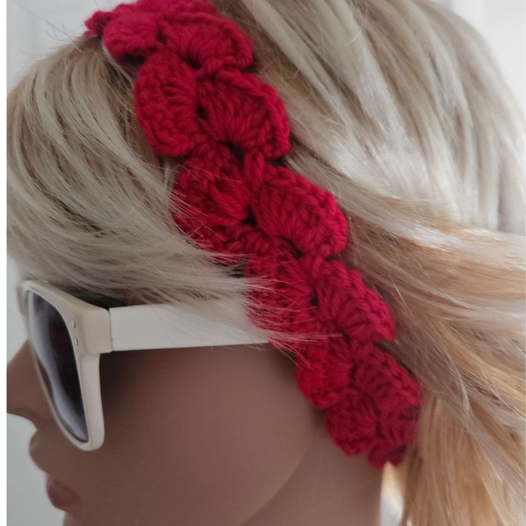 Red Petal Headband model side pose Adjustable Red Headband For The Beach, Adjustable Summer Headband With Handmade Flowers, Summer Adjustable Headband With Handmade Flowers, Summer Adjustable Handmade Flowers Headband, Adjustable Red Bohemian Headband, Adjustable Red Headband For Festivals, Handmade Adjustable Red Headband, Handmade Yarn Headband, Adjustable Headband With Handmade Flowers For Festivals