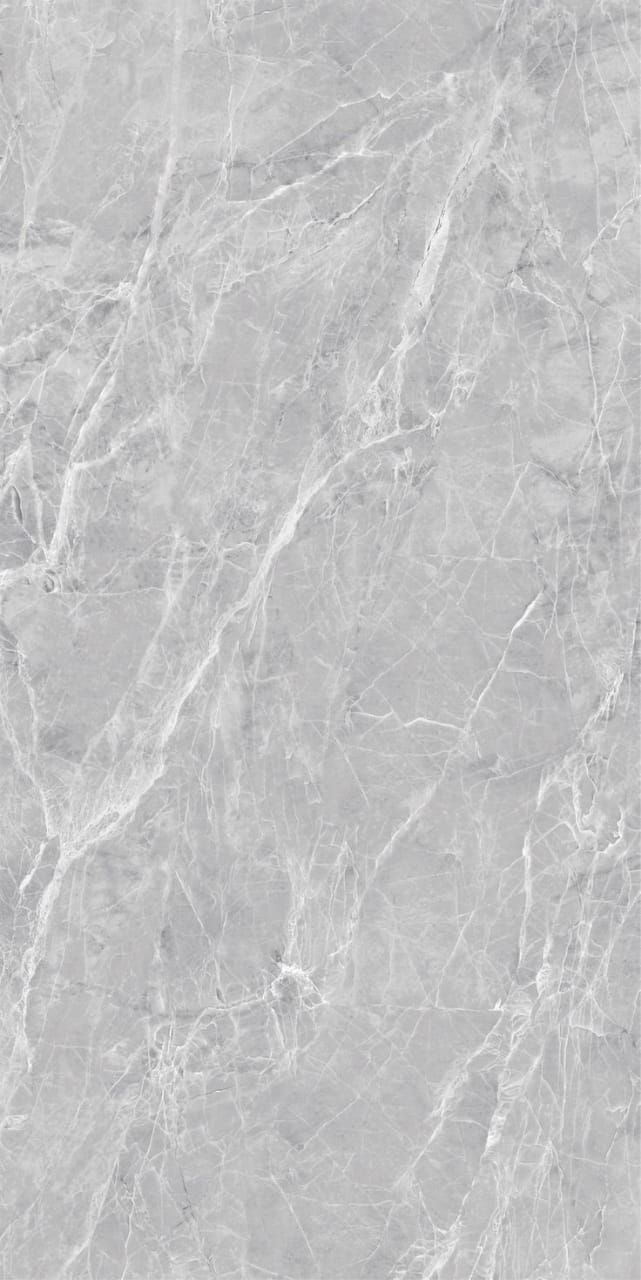 a white marble textured wallpaper with grey veining on the top and bottom