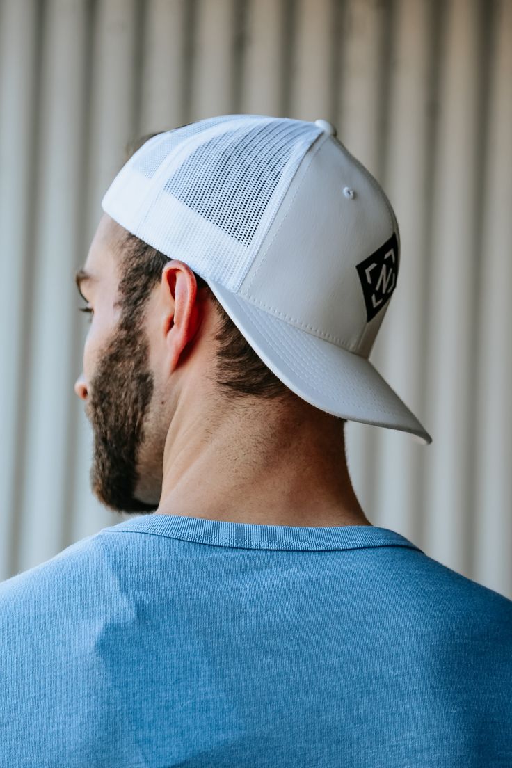 Special for all you Nashville locals, the Iconic Trucker is a stylish nod to the logo that we are known for! Features embroidered NASH curved above the snapback. Unisex Hard buckram. Structured Matching plastic snapback closure Matching undervisor, 8-row stitching on visor Urban Trucker Hat With Curved Visor For Baseball Season, White Flat Bill Trucker Hat For Baseball Season, White Adjustable Breathable Trucker Hat, White Trucker Baseball Cap With Logo Patch, White Breathable Trucker Hat, One Size Fits Most, Breathable White Trucker Hat, White Adjustable Flat Bill Dad Hat, White Adjustable Dad Hat, Adjustable White Baseball Cap For Outdoor