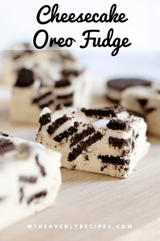 oreo cheesecake fudge is cut into squares and placed on a cutting board