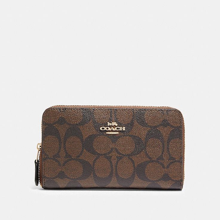 Coach Medium Id Zip Wallet In Signature Canvas Signature Coated Canvas Ten Credit Card Slots Bill Compartments Zip Coin Pocket Zip-Around Closure 6 1/2" (L) X 3 3/4" (H) X 3/4" (W) Style No. F88913 Color Im/Brown Black New Sealed In Original Packaging Classic Brown Evening Wallet, Coach Brown Evening Wallet, Brown Coach Wallets For Evening, Coach Brown Rectangular Wallet, Coach Brown Business Wallet, Coach Brown Wallet For Business, Everyday Coach Wallet, Elegant Brown Coach Wallet, Leather Billfold