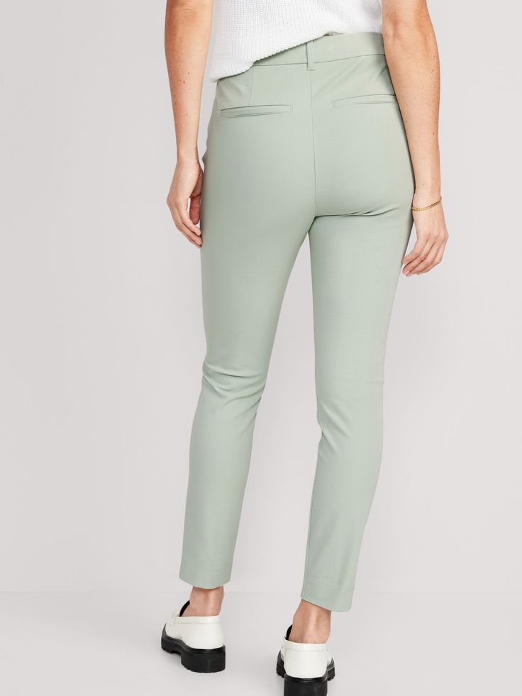 The Pixie pants you love, now in a more fabulous fit & fabric ✨ High-rise waistband, with hidden double hook-and-bar closure and interior button closure.  Hidden zip fly.  Diagonal pockets at front, with decorative welt faux pockets at back.  Smoot Versatile Tapered Leg Dress Pants For Spring, Mid-rise Pants With Elastic Waistband For Work, Versatile Fitted Bottoms For Office, Fitted Versatile Bottoms For Office, Trendy Stretch Pants With Belt Loops, Elegant Stretch Bottoms With Zipper Closure, Versatile Fitted Office Bottoms, Mid-rise Bottoms With Side Pockets For Work, Spring Elastane Bottoms With Tapered Leg