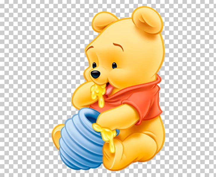 winnie the pooh sitting on top of a blue ball