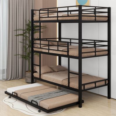 a bunk bed with three sets of mattresses on the bottom and one set below