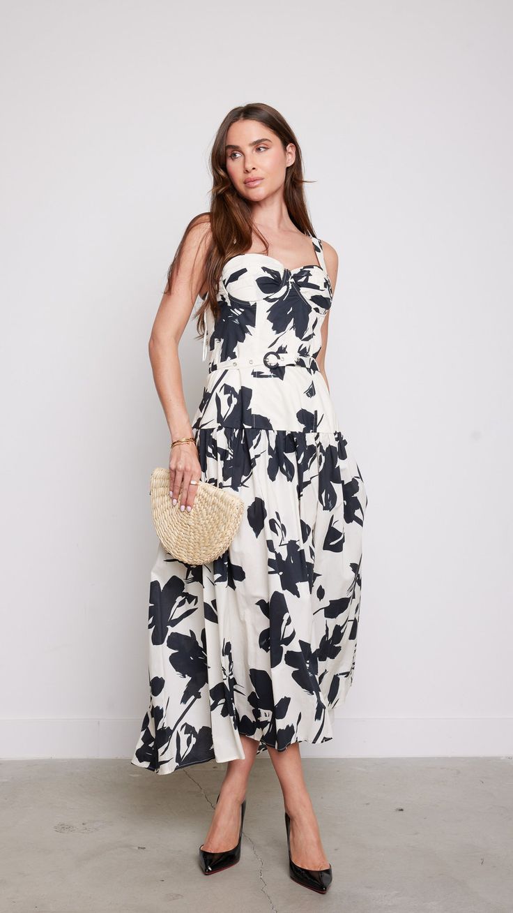 Indulge in the epitome of elegance with this delicate neck midi dress adorned with a mesmerizing floral design. Effortlessly chic, the cowl neckline drapes gracefully, while the midi length exudes sophistication. Features: Midi Princess Seam Floral Model is wearing a small 80482 F4-1 Floral Print Dress With Straight Neckline For Day Out, Vacation Midi Maxi Dress With Gathered Neckline, Vacation Floral Print Midi Dress With Square Neck, White Midi Dress With Floral Print And Straight Neckline, Chic Flowy Floral Print Dresses, Evening Floral Print Midi Dress, Midi Dress With Gathered Neckline For Vacation, Vacation Midi Dress With Gathered Neckline, Elegant Floral Midi Dress For Beach