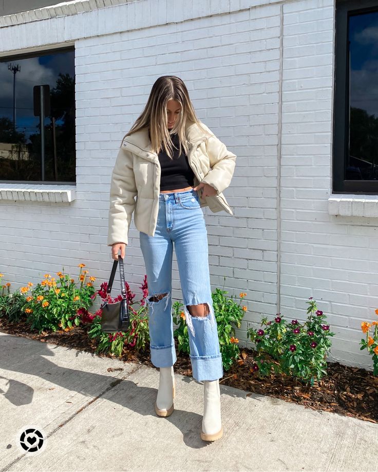 How To Style Cream Puffer Jacket, 90s Abercrombie Jeans, White Curdory Jacket Outfit, Short Cream Boots Outfit, Cream White Boots Outfit, Outfit Cream Boots, Dolce Vita Caster Boots Outfit, White Dress Boots Outfit, Creme Jacket Outfits