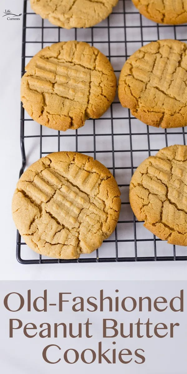 old - fashioned peanut butter cookies on a cooling rack with the words, old - fashioned peanut butter cookies